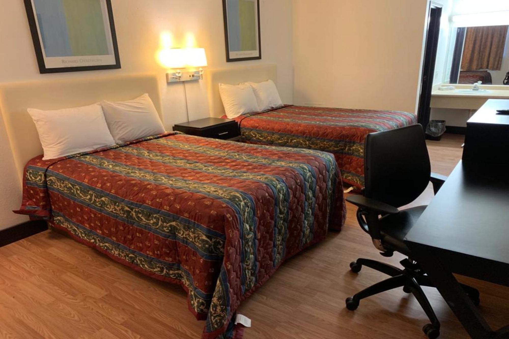 Economy Inn Of Holland Bagian luar foto